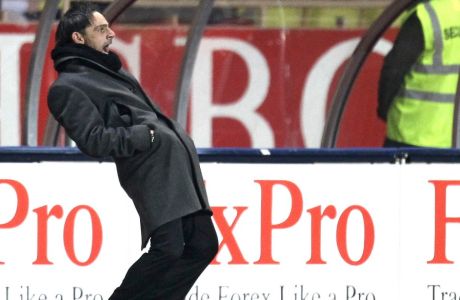 AS Monaco's coach, Marco Simone of Italy reacts during the French League two soccer match against Bastia, Monday, Feb. 13, in Monaco stadium. (AP Photo/Lionel Cironneau)
