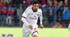 AC Milan's defender Cristian Zaccardo runs with the ball during his international friendly soccer match against Caen at the Michel dOrnano stadium in Caen, western France, Sunday, Oct. 13, 2013. (AP Photo/David Vincent)