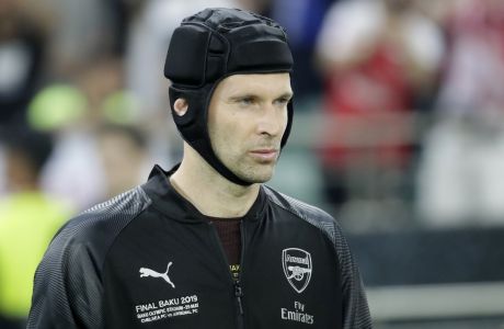 Arsenal goalkeeper Petr Cech team lines up for the anthems before the Europa League Final soccer match between Arsenal and Chelsea at the Olympic stadium in Baku, Azerbaijan, Wednesday, May 29, 2019. (AP Photo/Luca Bruno)