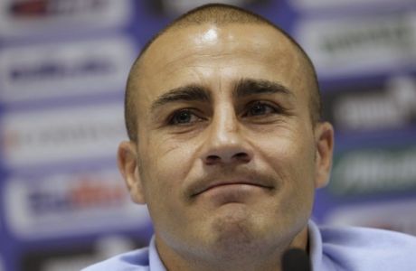 FILE -  In this June 25, 2010 filer Italian soccer team captain Fabio Cannavaro attends a press conference at Casa Azzurri, in Irene, near Pretoria, South Africa. Serie A title-contender Napoli and team captain Paolo Cannavaro have been ordered by the Italian football federation to face match-fixing allegations. Current and former Napoli players Gianluca Grava and Matteo Gianello and former Napoli assistant Silvio Giusti were also called in for questioning over the May 16, 2010, Sampdoria-Napoli match. (AP Photo/Alessandra Tarantino, Files)