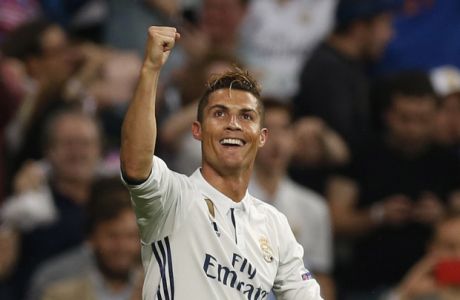 Real Madrid's Cristiano Ronaldo celebrates scoring his side's 3rd goal during the Champions League semifinal first leg soccer match between Real Madrid and Atletico Madrid at the Santiago Bernabeu stadium in Madrid, Spain, Tuesday, May 2, 2017. (AP Photo/Francisco Seco)