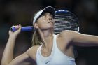 Russia's Maria Sharapova plays a return during the first round match against Slovakia's Magdalena Rybarikova at the Kremlin Cup tennis tournament in Moscow, Russia, Tuesday, Oct. 17, 2017. Maria Sharapova was beaten by Magdalena Rybarikova in the first round of the Kremlin Cup on Tuesday, ending her bid for a second title in two weeks. (AP Photo/Alexander Zemlianichenko)