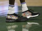 Milwaukee Bucks' Thon Maker's wears "Tom and Jerry" shoes during the first half of an NBA basketball game against the New York Knicks, Thursday, Dec. 27, 2018, in Milwaukee. (AP Photo/Jeffrey Phelps)