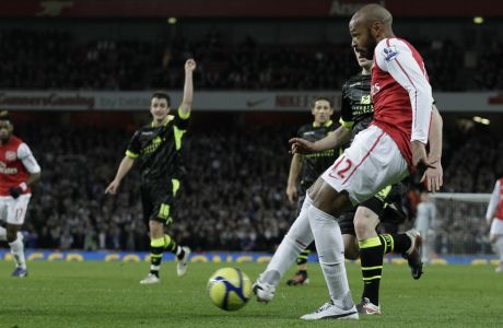 Arsenal's former player and new loan signing Thierry Henry scores on his first game back during the English FA Cup 3rd round soccer match between Arsenal and Leeds United at the Emirates Stadium in London, Monday, Jan. 9, 2012.  (AP Photo/Matt Dunham)