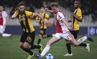 AEK's Dmytro Chygrynskiy, left, fights for the ball with Ajax's Frenkie de Jong during a Group E Champions League soccer match between AEK Athens and Ajax at the Olympic Stadium in Athens, Tuesday, Nov. 27, 2018. (AP Photo/Petros Giannakouris)