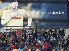 Tributes are paid to Emiliano Sala ahead of the French League One soccer match between Paris Saint-Germain and Bordeaux at the Parc des Princes stadium in Paris, Saturday, Feb. 9, 2019. (AP Photo/Christophe Ena)