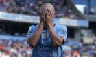 Manchester City's Erling Haaland reacts during the English Premier League soccer match between Manchester City and Bournemouth at Etihad stadium in Manchester, England, Saturday, Aug. 13, 2022. (AP Photo/Jon Super)