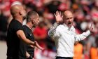 Manchester City's head coach Pep Guardiola, left, agrees with Manchester United's head coach Erik ten Hag during the English FA Cup final soccer match between Manchester City and Manchester United at Wembley Stadium in London, Saturday, June 3, 2023. (AP Photo/Dave Thompson)