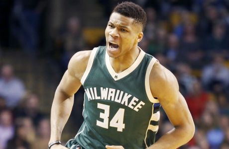 Milwaukee Bucks forward Giannis Antetokounmpo (34) reacts after hitting a basket during the first half of an NBA basketball game against the Boston Celtics, Wednesday, March 29, 2017, in Boston. (AP Photo/Mary Schwalm)