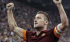 AS Roma's Francesco Totti celebrates after scoring against Juventus during their Italian Serie A soccer match at the Juventus stadium in Turin October 5, 2014.  REUTERS/Alessandro Garofalo (ITALY - Tags: SPORT SOCCER) - RTR490G5