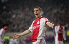 Ajax player Thomas Vermaelen, reacts during the UEFA Cup round of 32 second leg soccer match against Fiorentina at ArenA stadium in Amsterdam, Netherlands, Thursday Feb. 26, 2009. Ajax continues to the next round. (AP Photo/Peter Dejong)