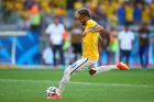 BELO HORIZONTE, BRAZIL - JUNE 28: Neymar of Brazil takes a penalty kick during the shootout of the 2014 FIFA World Cup Brazil round of 16 match between Brazil and Chile at Estadio Mineirao on June 28, 2014 in Belo Horizonte, Brazil.  (Photo by Paul Gilham/Getty Images)