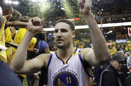 Golden State Warriors guard Klay Thompson (11) walks off the floor after Game 2 of basketball's NBA Finals against the Cleveland Cavaliers in Oakland, Calif., Sunday, June 4, 2017. (AP Photo/Marcio Jose Sanchez)