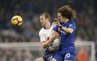 Tottenham's Harry Kane, left, challenges for the ball with Chelsea's David Luiz during the English Premier League soccer match between Chelsea and Tottenham Hotspur at Stamford Bridge stadium, in London, Wednesday, Feb. 27, 2019. (AP Photo/Tim Ireland)