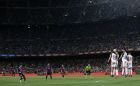 FC Barcelona's Lionel Messi, left, kicks a free shoot during the Spanish La Liga soccer match between FC Barcelona and Alaves at the Camp Nou stadium in Barcelona, Spain, Saturday, Aug. 18, 2018. (AP Photo/Manu Fernandez)