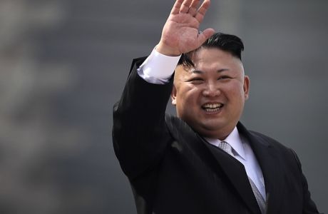 In this Saturday, April 15, 2017 photo, North Korean leader Kim Jong Un waves during a military parade in Pyongyang, North Korea, to celebrate the 105th birth anniversary of Kim Il Sung, the country's late founder and grandfather of current ruler Kim Jong Un. (AP Photo/Wong Maye-E, File)