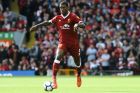 Liverpool's Georginio Wijnaldum plays the ball during the English Premier League soccer match between Liverpool and Manchester United at Anfield, Liverpool, England, Saturday, Oct. 14, 2017. (AP Photo/Rui Vieira)