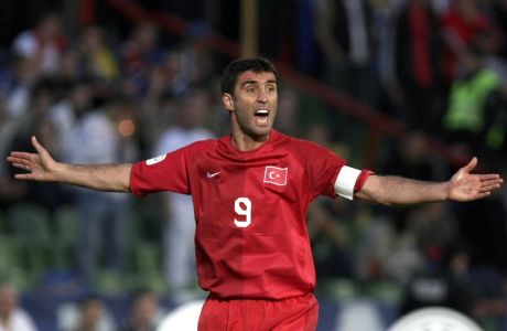 FILE - In this Saturday, June 2, 2007, file photo Turkey's Hakan Sukur reacts during the Group C Euro 2008 qualifying soccer match against Bosnia at the Olympic stadium in Sarajevo. Turkey's state-run news agency reports Friday, Aug. 12, 2016, authorities have issued an arrest warrant for former soccer star and legislator Hakan Sukur over his alleged links to a U.S.-based Muslim cleric, accused by Turkey of masterminding last month's failed coup. (AP Photo/Amel Emric, FILE)