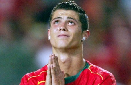 Portugal's Cristiano Ronaldo reacts after missing a scoring chance during the Euro 2004 soccer championship final match between Portugal and Greece at the Luz stadium in Lisbon, Portugal, Sunday, July 4, 2004. (AP Photo/Thomas Kienzle) ** FOR EDITORIAL USE ONLY NO WIRELESS COMMERCIAL OR PROMOTIONAL LICENSING PERMITTED **