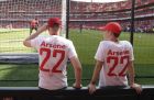 Ball boys wear special t-shirts with the name of Arsene Wenger on them before the English Premier League soccer match between Arsenal and Burnley at the Emirates Stadium in London, Sunday, May 6, 2018. The match is Arsenal manager Arsene Wenger's last home game in charge after announcing in April he will stand down as Arsenal coach at the end of the season after nearly 22 years at the helm. (AP Photo/Matt Dunham)