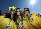 SAO PAULO, BRAZIL - JUNE 12:  Fans of Brazil pose before the Opening Ceremony of the 2014 FIFA World Cup Brazil prior to the Group A match between Brazil and Croatia at Arena de Sao Paulo on June 12, 2014 in Sao Paulo, Brazil.  (Photo by Warren Little/Getty Images)