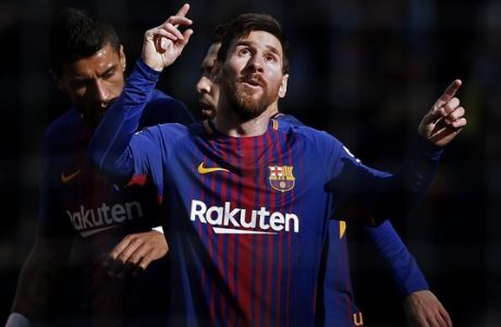 FC Barcelona's Lionel Messi celebrates after scoring during a Spanish La Liga soccer match between FC Barcelona and Celta Vigo at the Camp Nou stadium in Barcelona, Saturday, Dec. 2, 2017. (AP Photo/Manu Fernandez)