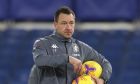 Aston Villa assistant head coach John Terry fetches balls during a warmup prior to the English Premier League soccer match between Chelsea and Aston Villa in London, England, Monday, Dec. 28, 2020. (Catherine Ivill/Pool via AP)