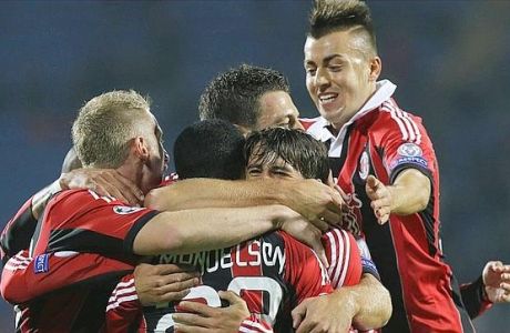 AC Milan players celebrate their goal against Zenit during their Champions League, Group C, soccer match, between AC Milan and Zenit St. Petersburg in St.Petersburg, Russia, Wednesday, Oct. 3, 2012. (AP Photo/Dmitry Lovetsky)