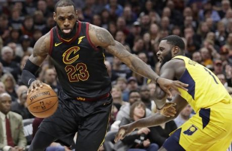 Cleveland Cavaliers' LeBron James, left, drives past Indiana Pacers' Lance Stephenson in the first half of Game 7 of an NBA basketball first-round playoff series, Sunday, April 29, 2018, in Cleveland. (AP Photo/Tony Dejak)
