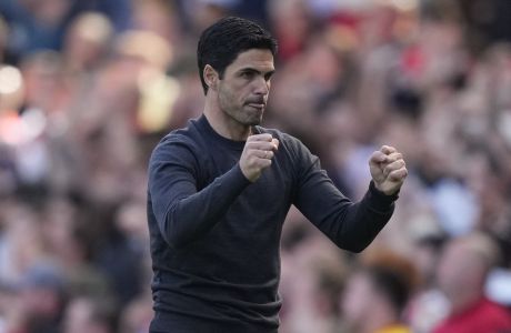 Arsenal's manager Mikel Arteta gestures during the English Premier League soccer match between Arsenal and Leeds United at the Emirates Stadium, in London Sunday, May 8, 2022. (AP Photo/Frank Augstein)