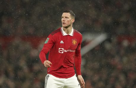 Manchester United's Wout Weghorst stands on the pitch during the English League Cup semifinal second leg soccer match between Manchester United and Nottingham Forest at Old Trafford in Manchester, England, Wednesday, Feb. 1, 2023. (AP Photo/Dave Thompson)