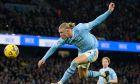 Manchester City¥s Erling Haaland kicks the ball during the English Premier League soccer match between Manchester City and Chelsea at the Etihad stadium in Manchester, England, Saturday, Feb. 17, 2024. (AP Photo/Dave Thompson)