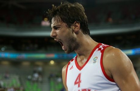 Croatia's Ante Tomic reacts after scoring a two-points shot against Greece during their EuroBasket European Basketball Championship Group F match at the Stozice Arena, in Ljubljana, Slovenia, Monday, Sept. 16, 2013. (AP Photo/Thanassis Stavrakis)