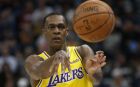 Los Angeles Lakers guard Rajon Rondo (9) passes the ball against the Utah Jazz during the first half of an NBA basketball game Wednesday, March 27, 2019, in Salt Lake City. (AP Photo/Rick Bowmer)
