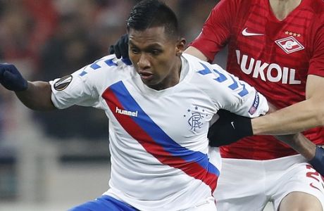 Rangers' Alfredo Morelos, left, and Spartak's Ilya Kutepov challenge for the ball during the Europa League Group G soccer match between Spartak Moscow and Rangers at the Otkrytiye Arena stadium in Moscow, Russia, Thursday, Nov. 8, 2018. (AP Photo/Pavel Golovkin)