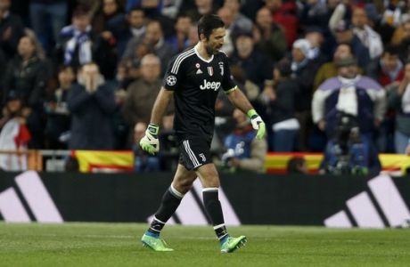 Juventus goalkeeper Gianluigi Buffon leaves the game after receiving a red card, during a Champions League quarter final second leg soccer match between Real Madrid and Juventus at the Santiago Bernabeu stadium in Madrid, Wednesday, April 11, 2018. (AP Photo/Francisco Seco)