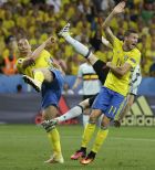 Sweden's Marcus Berg, right, reacts as his teammate Zlatan Ibrahimovic, left, shoots on the goal during the Euro 2016 Group E soccer match between Sweden and Belgium at the Allianz Riviera stadium in Nice, France, Wednesday, June 22, 2016. (AP Photo/Thanassis Stavrakis)