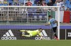 Italy's goalkeeper Alessandro Plizzari saves a penalty shot from Uruguay's forward Rodrigo Amaral during their play-off for third place match in the FIFA U-20 World Cup Korea 2017 at Suwon World Cup Stadium in Suwon, South Korea, Sunday, June 11, 2017. (AP Photo/Ahn Young-joon)