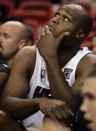 Miami Heat forward Antoine Walker looks up at the scoreboard in the fourth quarter during a preseason basketball game against the Atlanta Hawks in Miami Wednesday, Oct. 10, 2007. The Hawks won in overtime 106-100. (AP Photo/Lynne Sladky)