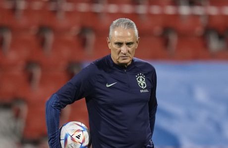 Brazil's head coach Tite attends a training session at the Grand Hamad stadium in Doha, Qatar, Sunday, Dec. 4, 2022. Brazil will face South Korea in a World Cup round of 16 soccer match on Dec. 5. (AP Photo/Andre Penner)