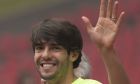 FILE-In this Friday, Oct. 10, 2014 file photo, Brazil's Kaka waves as he arrives for a training session ahead of a friendly match against Argentina at the Bird's Nest National Stadium in Beijing, China. Former Ballon dOr winner Kaka says he is retiring from soccer at age 35, it was reported on Sunday, Dec. 17, 2017. (AP Photo/Ng Han Guan, File)