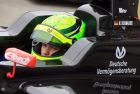 German racing driver Mick Schumacher of the Dutch team 'Van Amersfoort Racing' sits in his racing car at the Motorsport Arena in Oschersleben, Germany, Wednesday, April 8, 2015. The teenage son of former Formula One champion Michael Schumacher completed his first public test drive on Wednesday. (AP Photo/dpa, Jens Wolf)