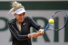 Amanda Anisimova of the U.S. plays a shot against Australia's Ashleigh Barty during their semifinal match of the French Open tennis tournament at the Roland Garros stadium in Paris, Friday, June 7, 2019. (AP Photo/Michel Euler)