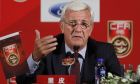 China's newly appointed national football team coach Marcello Lippi speaks during a news conference at a hotel in Beijing, Friday, Oct. 28, 2016. Lippi has urged his China team and the nation to pull together to accomplish the "improbable" task of qualifying for the 2018 World Cup before he begins a thorough overhaul of the struggling football program. (AP Photo/Andy Wong)