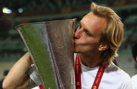 TURIN, ITALY - MAY 14:  Ivan Rakitic of Sevilla poses with the trophy during the UEFA Europa League Final match between Sevilla FC and SL Benfica at Juventus Stadium on May 14, 2014 in Turin, Italy.  (Photo by Michael Steele/Getty Images)