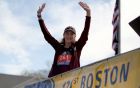 Kathrine Switzer, who was the first official woman entrant in the Boston Marathon 50 years ago, acknowledges the crowd as she is introduced before firing the gun to start the women's elite division at the start of the 2017 Boston Marathon in Hopkinton, Mass., Monday, April 17, 2017. (AP Photo/Mary Schwalm)