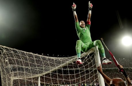 Egypt's goalkeeper Essam El Hadary celebrates after defeating Congo in the 2018 World Cup group E qualifying soccer match at the Borg El Arab Stadium in Alexandria, Egypt, Sunday, Oct. 8, 2017. Egypt won 2-1. (AP Photo/Nariman El-Mofty)