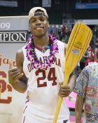 Oklahoma guard Buddy Hield (24) poses for a photo after he was voted the Diamond Head Classic tournament most valuable player after his team beat Harvard in an NCAA college basketball game, Friday, Dec. 25, 2015, in Honolulu. Oklahoma won 83-71. (AP Photo/Eugene Tanner)