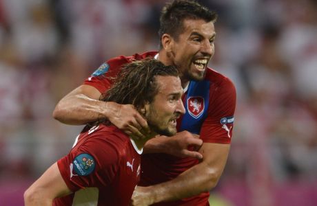 Czech midfielder Petr Jiracek (L) celebrates with Czech forward Milan Baros after scoring a goal during the Euro 2012 championships football match between the Czech Republic and Poland on June 16, 2012 at the Municipal  Stadium in Wroclaw. AFP PHOTO / FABRICE COFFRINI        (Photo credit should read FABRICE COFFRINI/AFP/GettyImages)