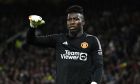 Manchester United's Andre Onana during the English Premier League soccer match between Manchester United and Wolverhampton Wanderers at the Old Trafford stadium in Manchester, England, Monday, Aug. 14, 2023. (AP Photo/Rui Vieira)